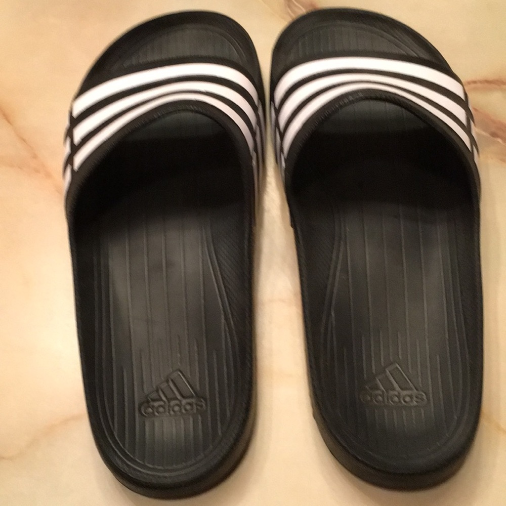Adidas men’s size 9 slides.